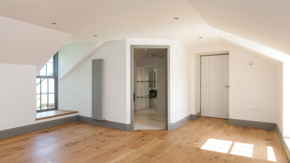 The master bedroom features underfloor heating and oak flooring.