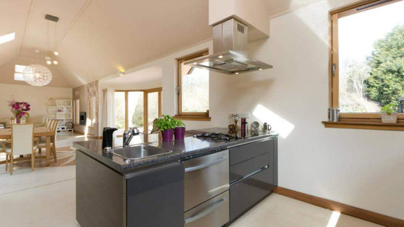 A double-height open plan kitchen, dining and living area created a welcoming space to be enjoyed by all the family.