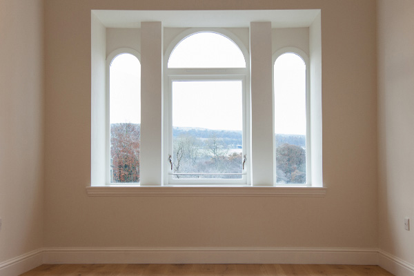 The library features a triple arched window