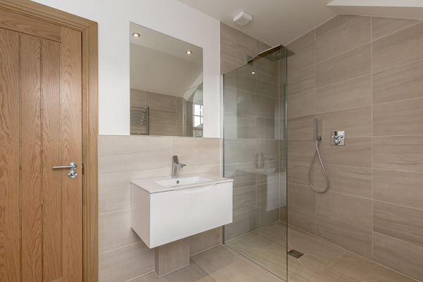 Wet room design with wall hung vanity unit